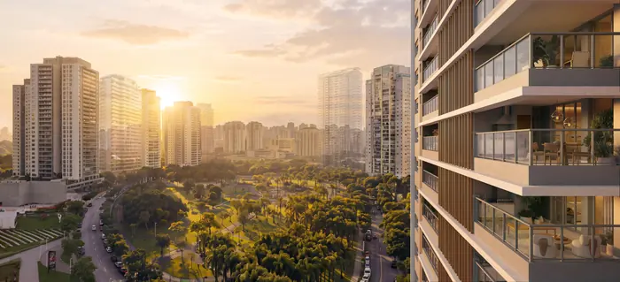 As sacadas da torre à direita e, à esquerda, o Parque Jardim das Perdizes e a cidade ao pôr do sol