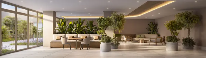 Salão multiuso com bancos, poltronas e vasos de árvores, aberto por um vidro para o jardim
